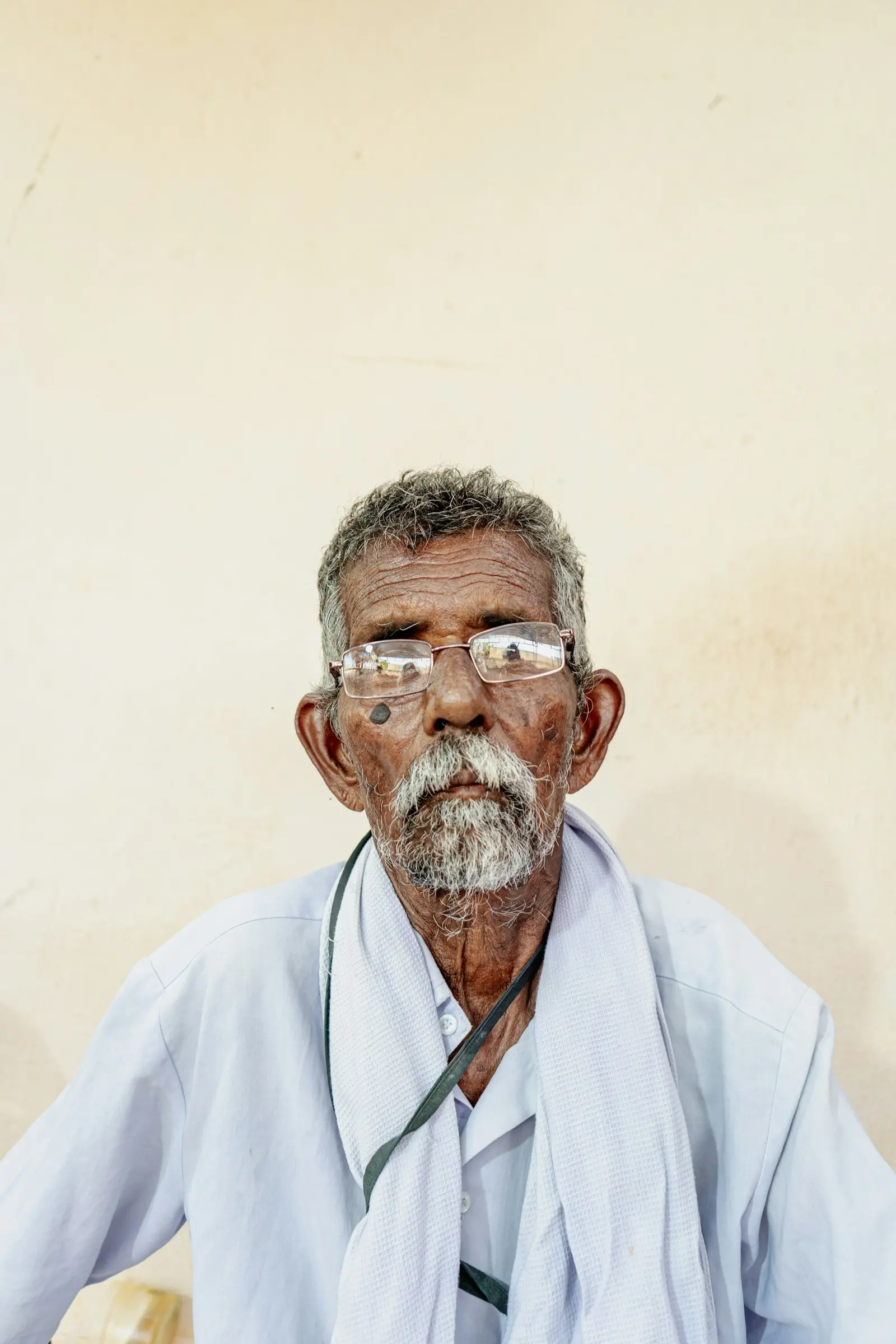 Older man wearing glasses