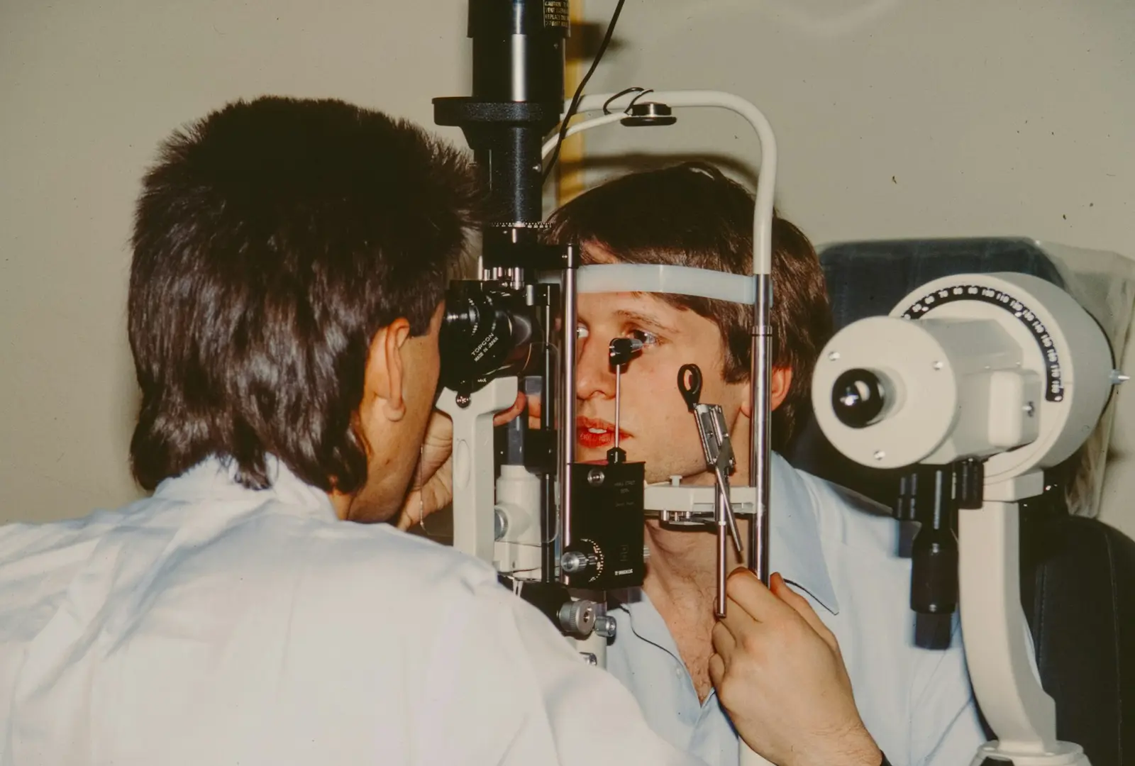 Eye examination at a slit lamp microscope
